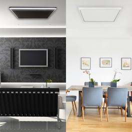 Wohnzimmer mit schwarzer und weißer Infrarotheizung
