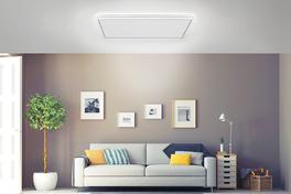 [Translate to Französisch:] Wohnzimmer Infrarotheizung Deckenmontage mit Licht
