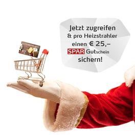 Hand von Weinachtsmann mit Einkaufswagen und Gutschein